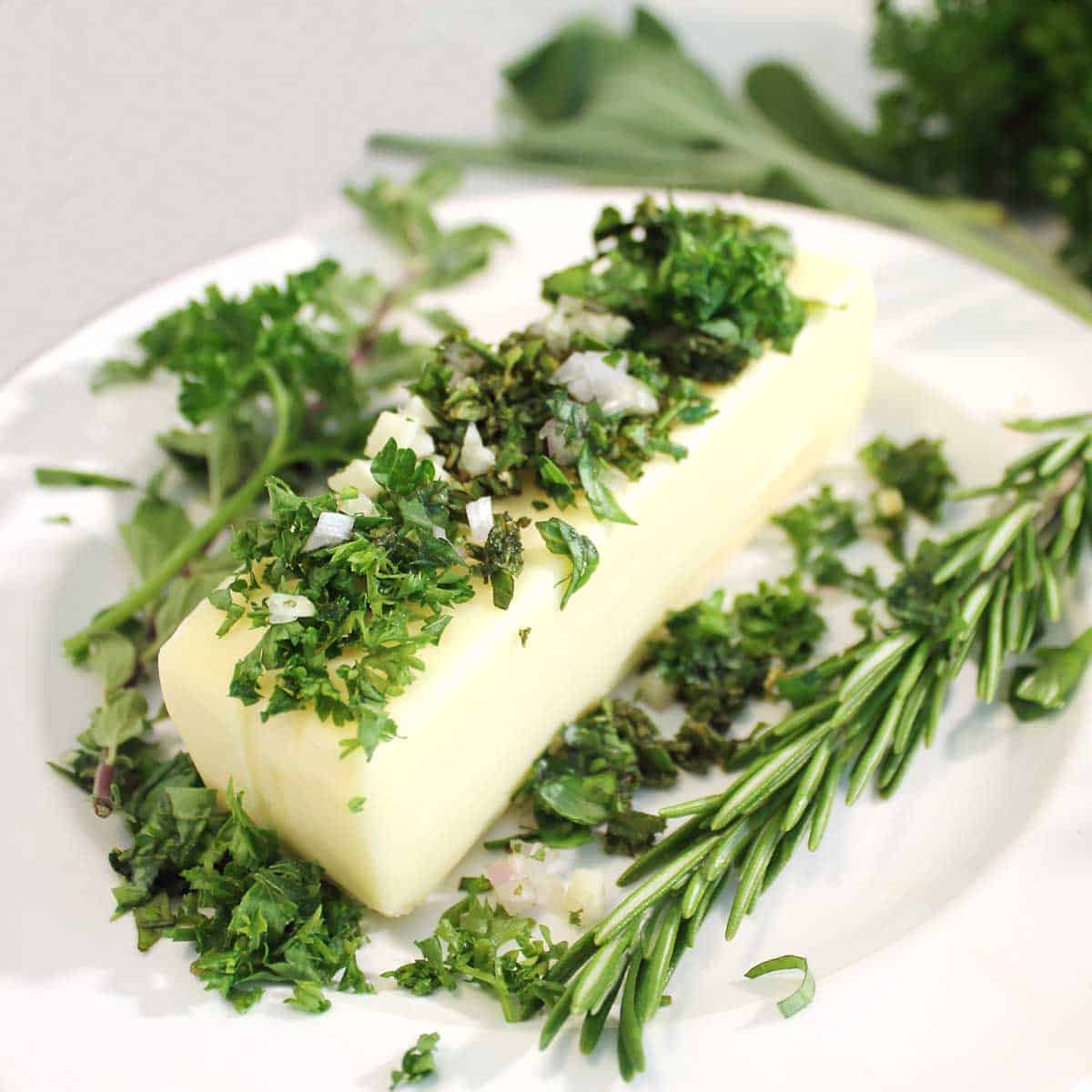 Butter with herbs on top.