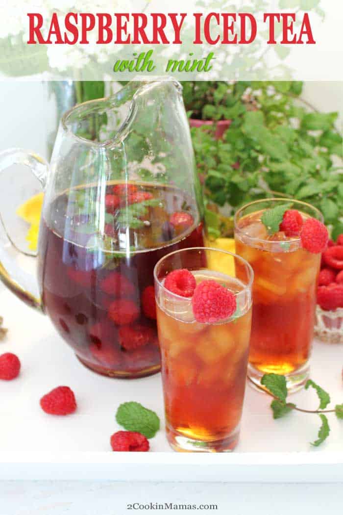 Raspberry Mint Iced Tea tall | 2 Cookin Mamas This Raspberry Mint Iced Tea recipe takes your favorite summertime refreshment up a notch. Juicy raspberries and savory mint leaves are added to fresh brewed tea to impart a sweet berry flavor with a touch of mint to classic iced tea. It's a tastier and healthier way to quench your thirst. #icedtea #beverage #summerdrink #raspberry tea #raspberries #mint #tea #drink #recipe