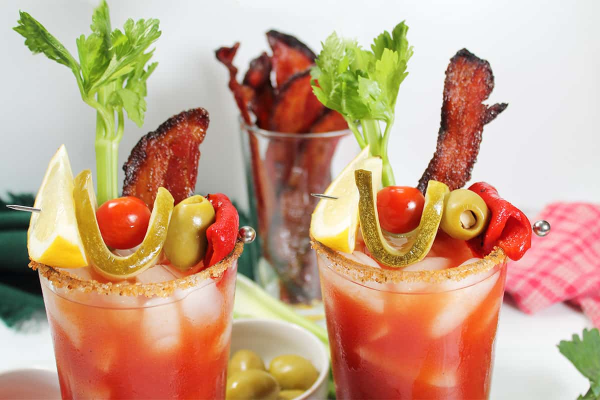 Top of two bloody mary with tequila cocktails showing salt rim.