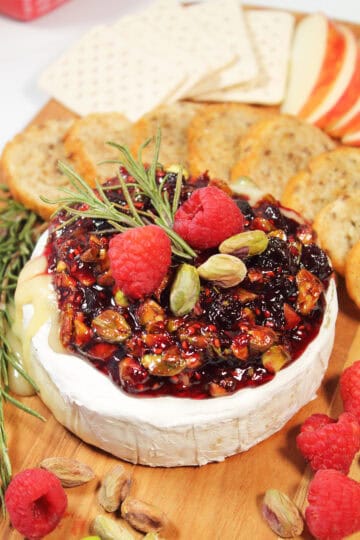 Air Fryer Baked Brie on serving board.