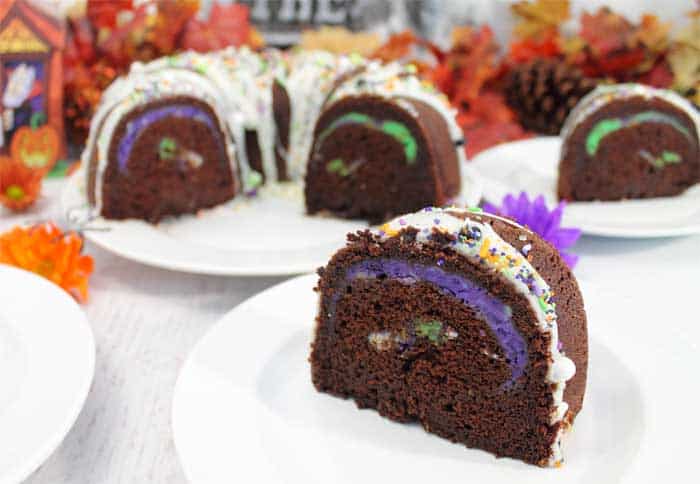 Chocolate Brown Sugar Bundt Cake with Cheesecake Swirl slice in foreground