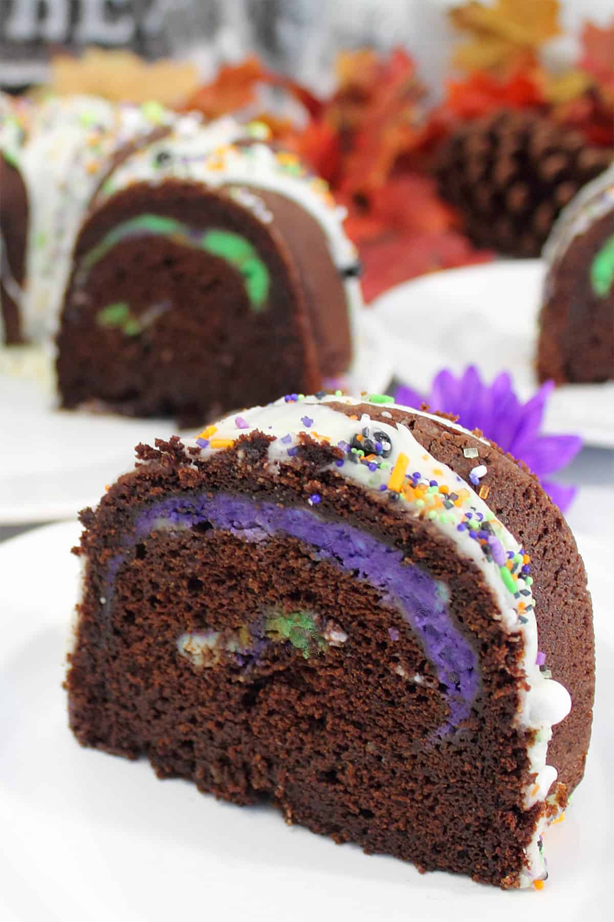 Closeup of slice of cake in foreground.