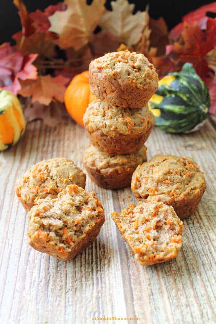 Stacked Carrot Muffins stacked These easy to make pineapple carrot muffins on wooden table.