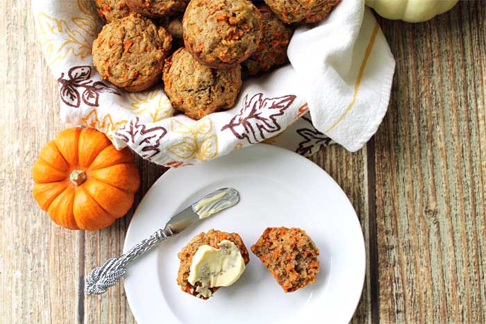 Pineapple Carrot Muffins with a smear of cream cheese