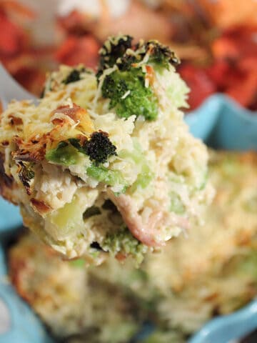 Spoonful of cheesy chicken broccoli casserole.