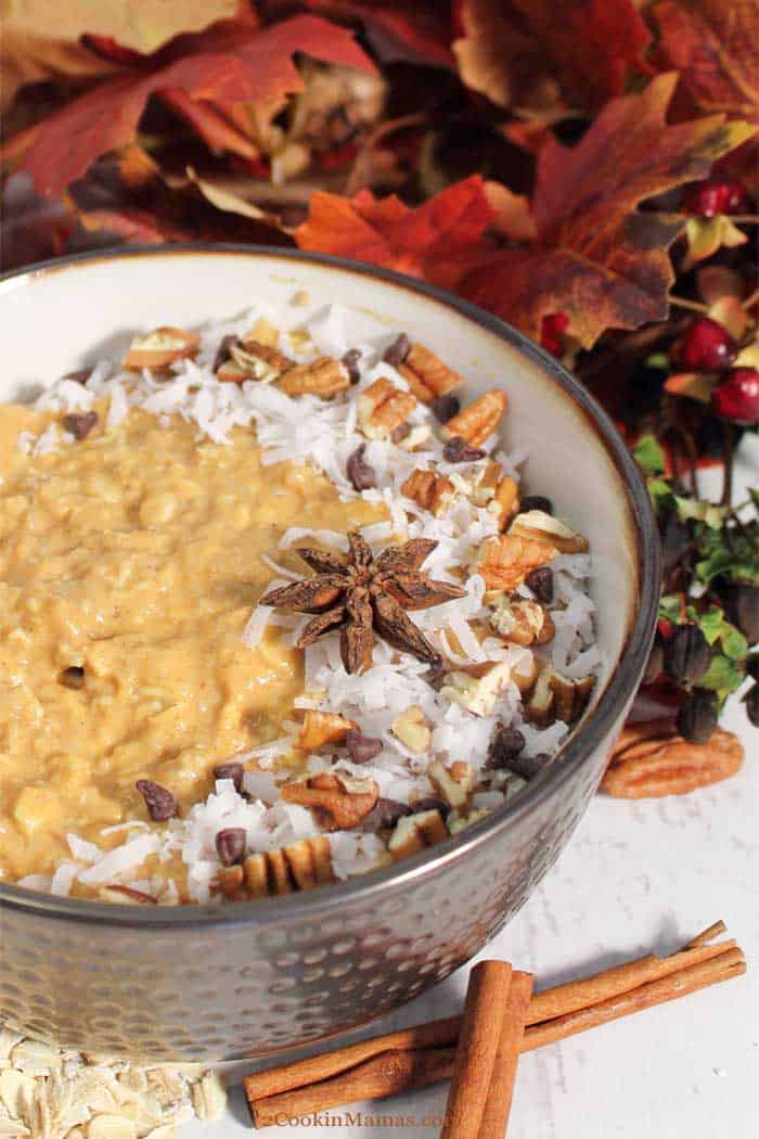 Pumpkin Pie Overnight Oats tall | 2 Cookin Mamas Hot, healthy oatmeal for breakfast during the week is not a dream! This Pumpkin Pie Overnight Oats is easy to prepare the night before then just heat and serve the next morning. Full of pumpkin pie flavor and spice and plenty of protein and fiber, it's bound to get your day started on the right foot. #oatmeal #overnightoats #breakfast #easyrecipe #recipe #pumpkin #greekyogurt #maplesyrup #oats