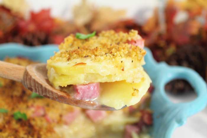 Cheesy Scalloped Potatoes and Ham spoonful layer closeup