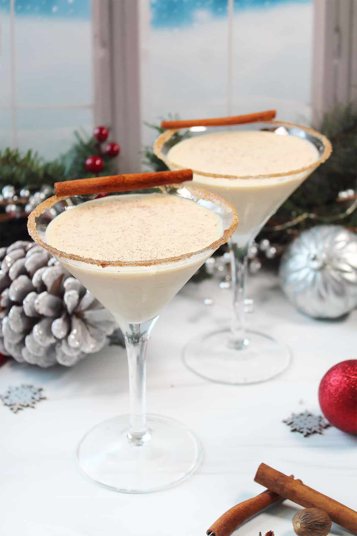 Two holiday cocktails with cinnamon sugar rim/