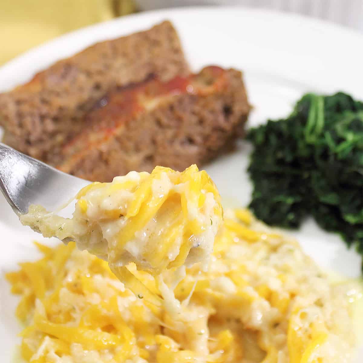 Butternut Squash casserole plated with dinner.