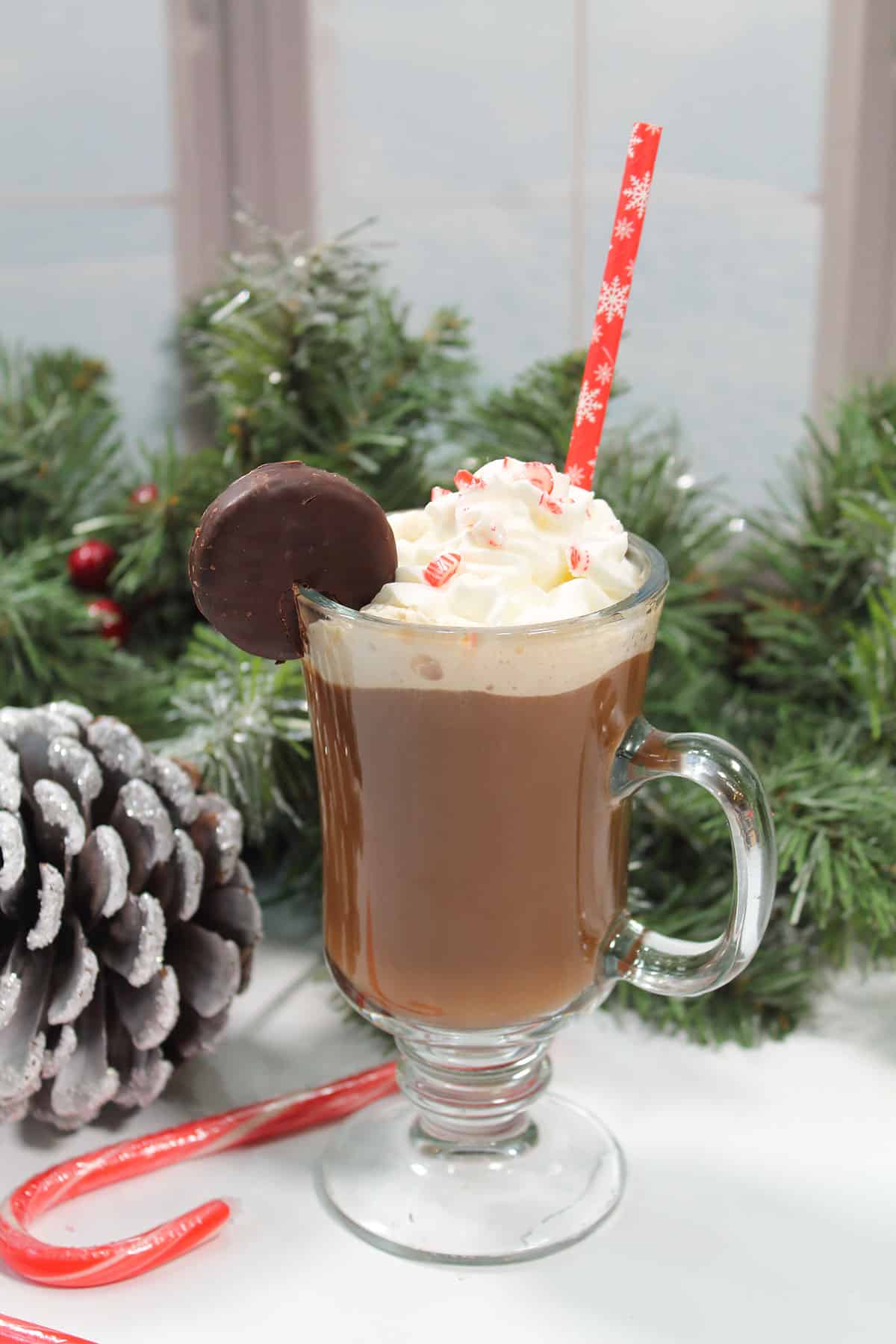 Peppermint patty cocktail in mug with peppermint patty garnish.