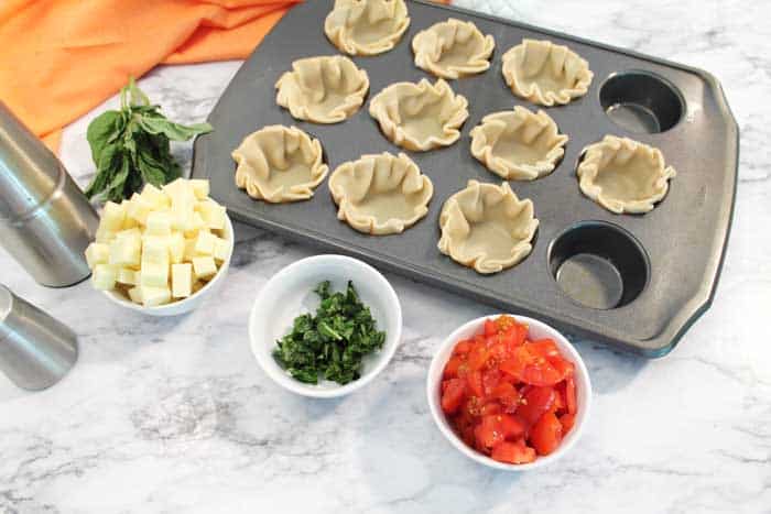 Chopped tomatoes, basil, diced-cheese ready to fill empanadas