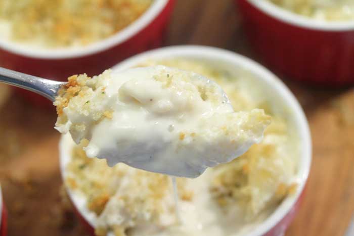 spoonful closeup of Baked Mac and Cheese in ramekin