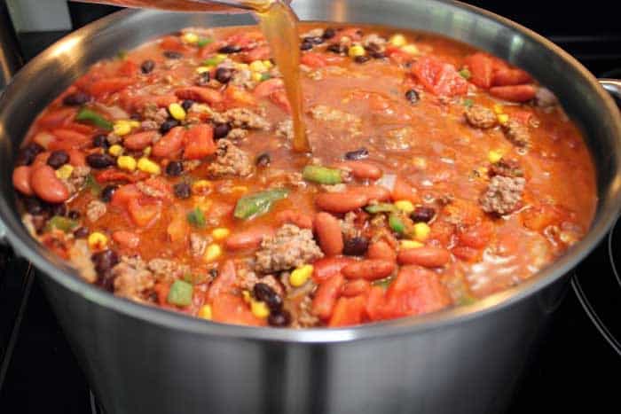 Chili cooking in stainless steel stockpot.