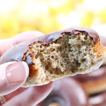 Closeup of donut with bite out of it.