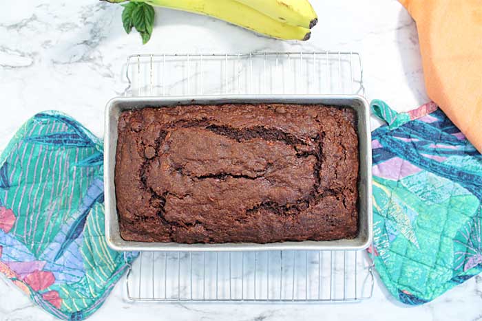 Cool chocolate bread in loaf pan.