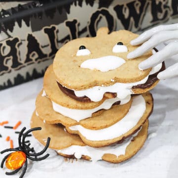 Stacked Halloween smores cookies with spider.