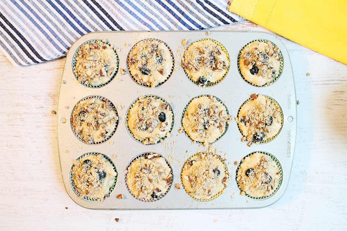 Ready to bake blueberry lemon muffins with streusel.