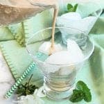 Pouring irish cream over ice