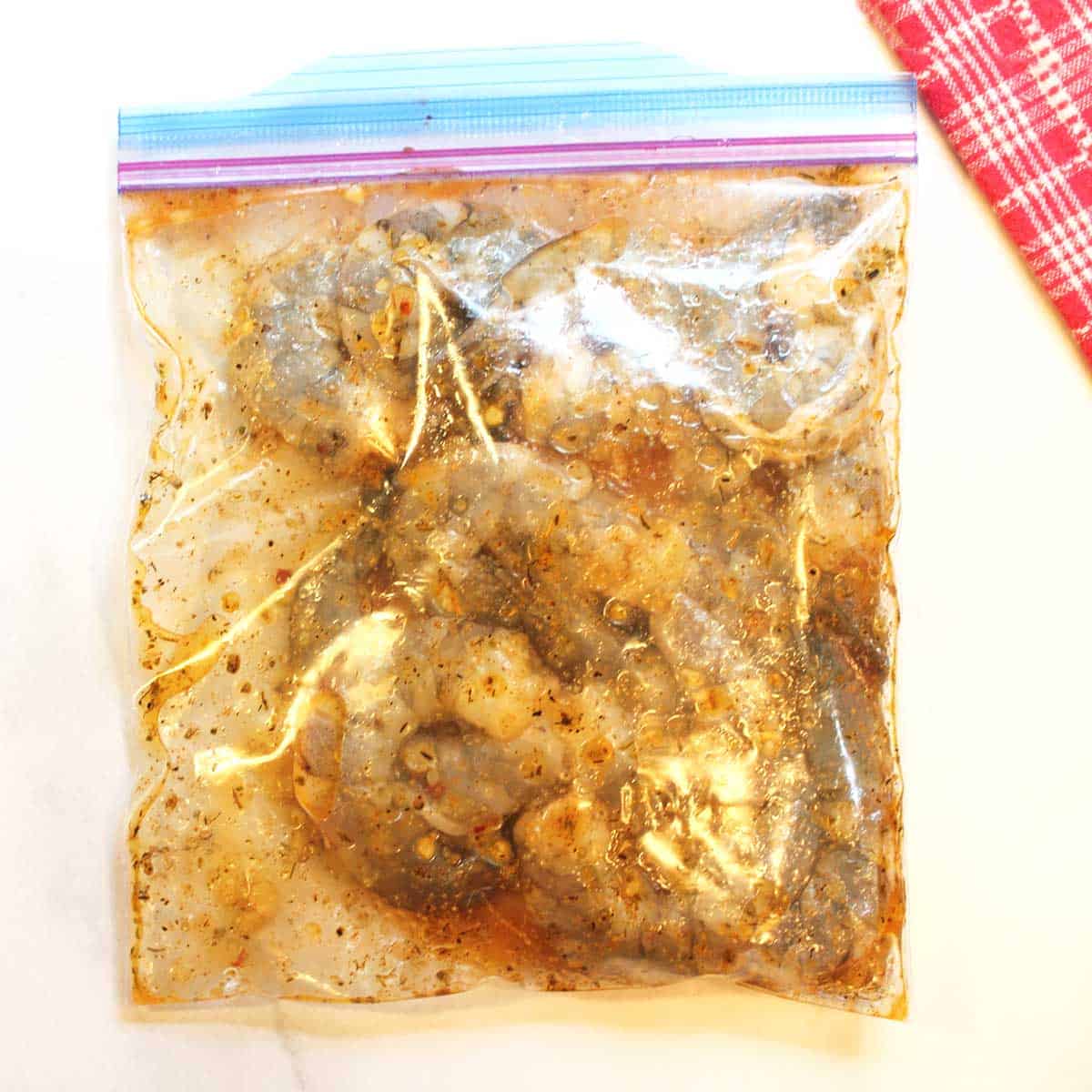 Marinating shrimp in ziplock bag.