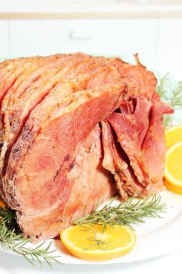 Maple Brown Sugar Glazed Ham on dressed platter.