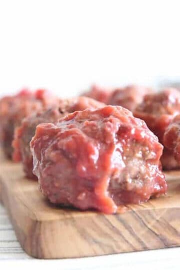 Paleo Meatballs on wooden board.