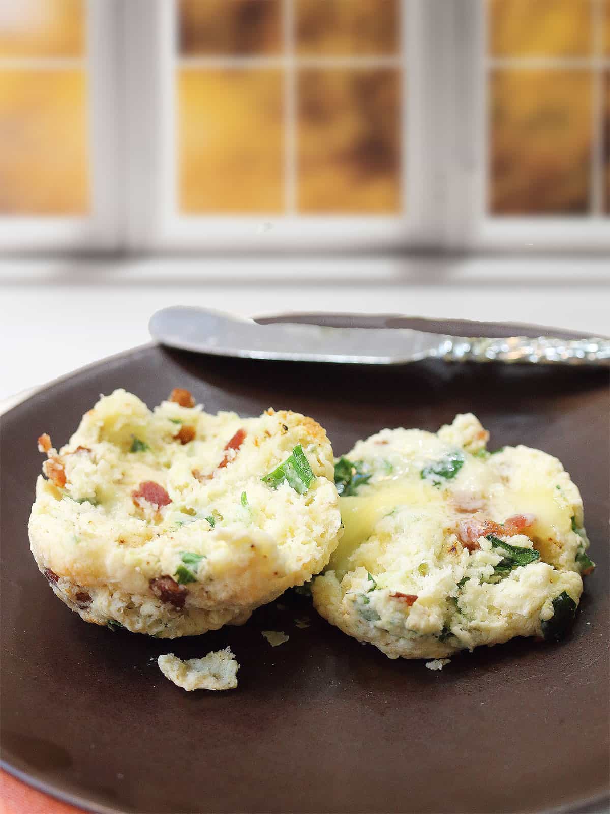 Halved scone with butter.