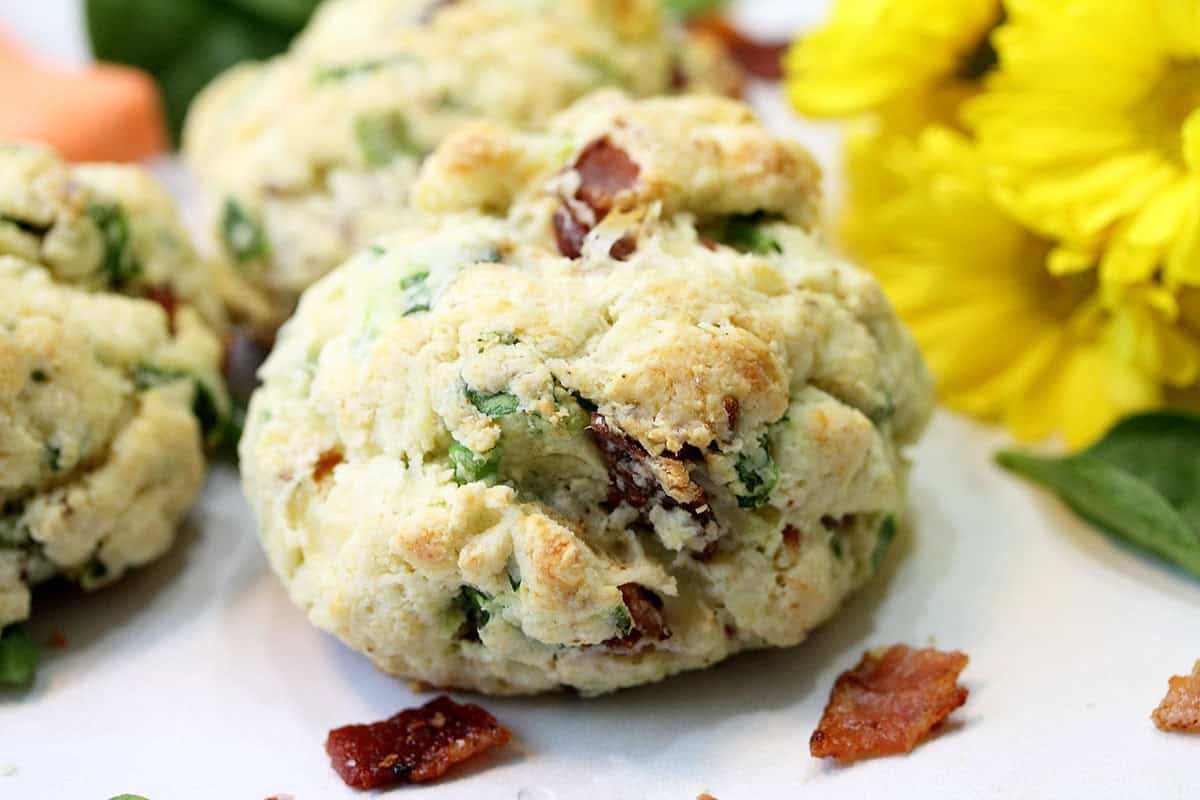 Closeup of single cheddar bacon scone.