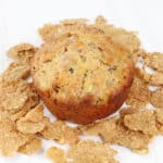 Single Zucchini Bran Muffin among bran flakes.