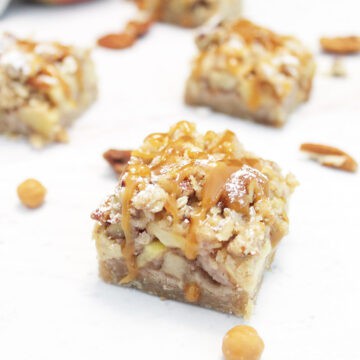 Caramel Apple Bar sprinkled with powdered sugar and drizzled with caramel.