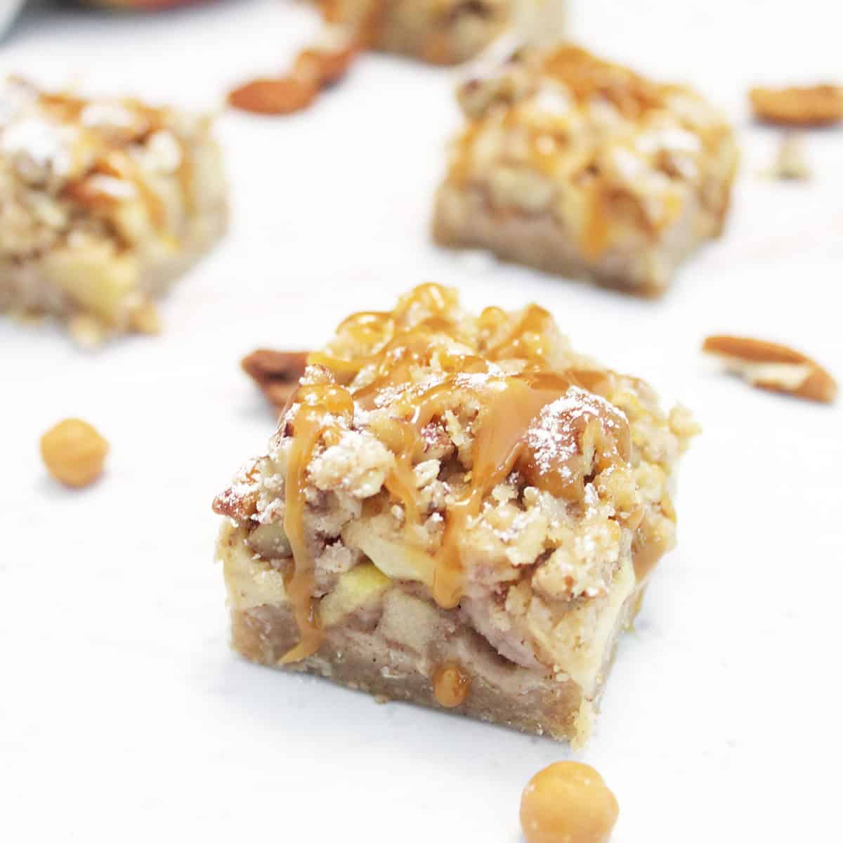 Caramel Apple Bar sprinkled with powdered sugar and drizzled with caramel.