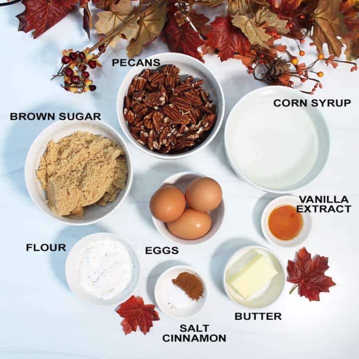 Ingredients for bars pecan filling on white table.