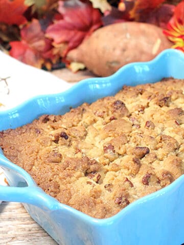 cropped-Baked-casserole-in-turquoise-baking-dish-with-fall-leaves-and-sweet-potato-in-back-900x1200-1.jpg