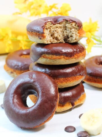 cropped-Stacked-donuts-with-one-leaning-on-side-and-bite-out-of-top-one-900x1200-1.jpg