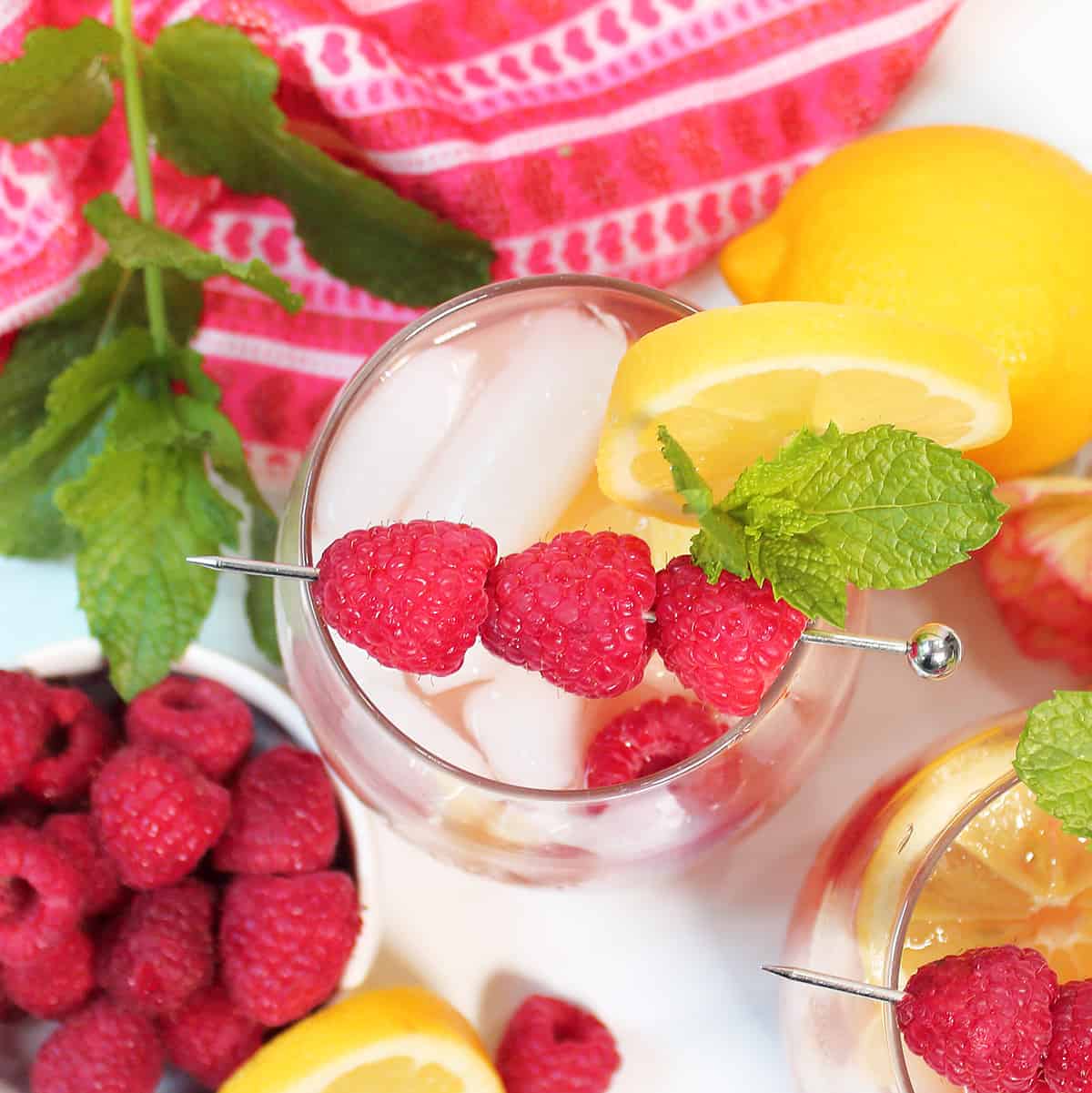 Overhead of one raspberry lemonade cocktail.