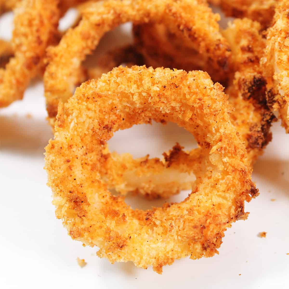 Close up of air fryer onion ring.