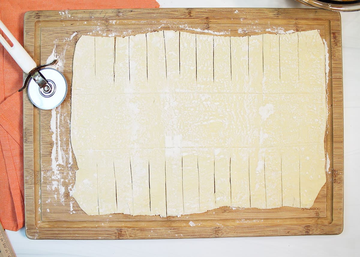 Cutting strips in puff pastry.