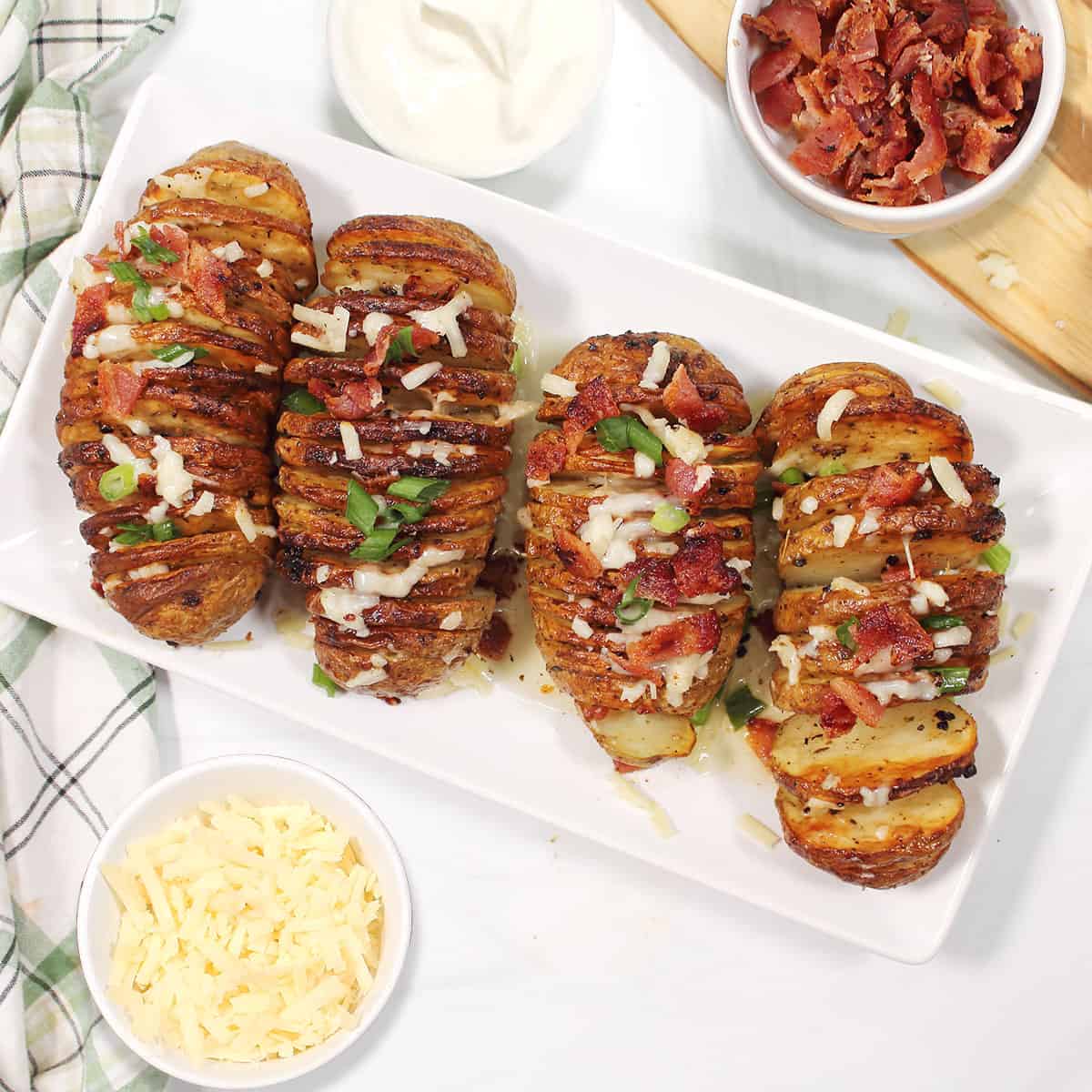 Air Fryer Loaded Hasselback Potatoes - A Family Feast®