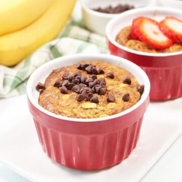 Two air fryer baked oatmeal with toppings.