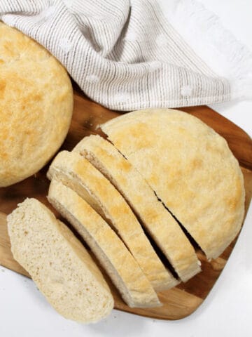 Whole loaf air fryer bread and sliced loaf.