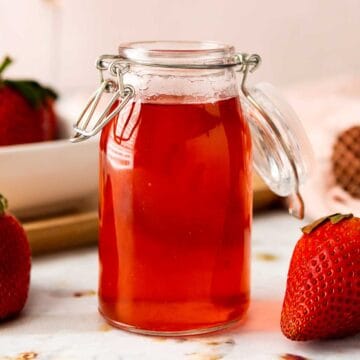 Closeup of syrup in a jar.