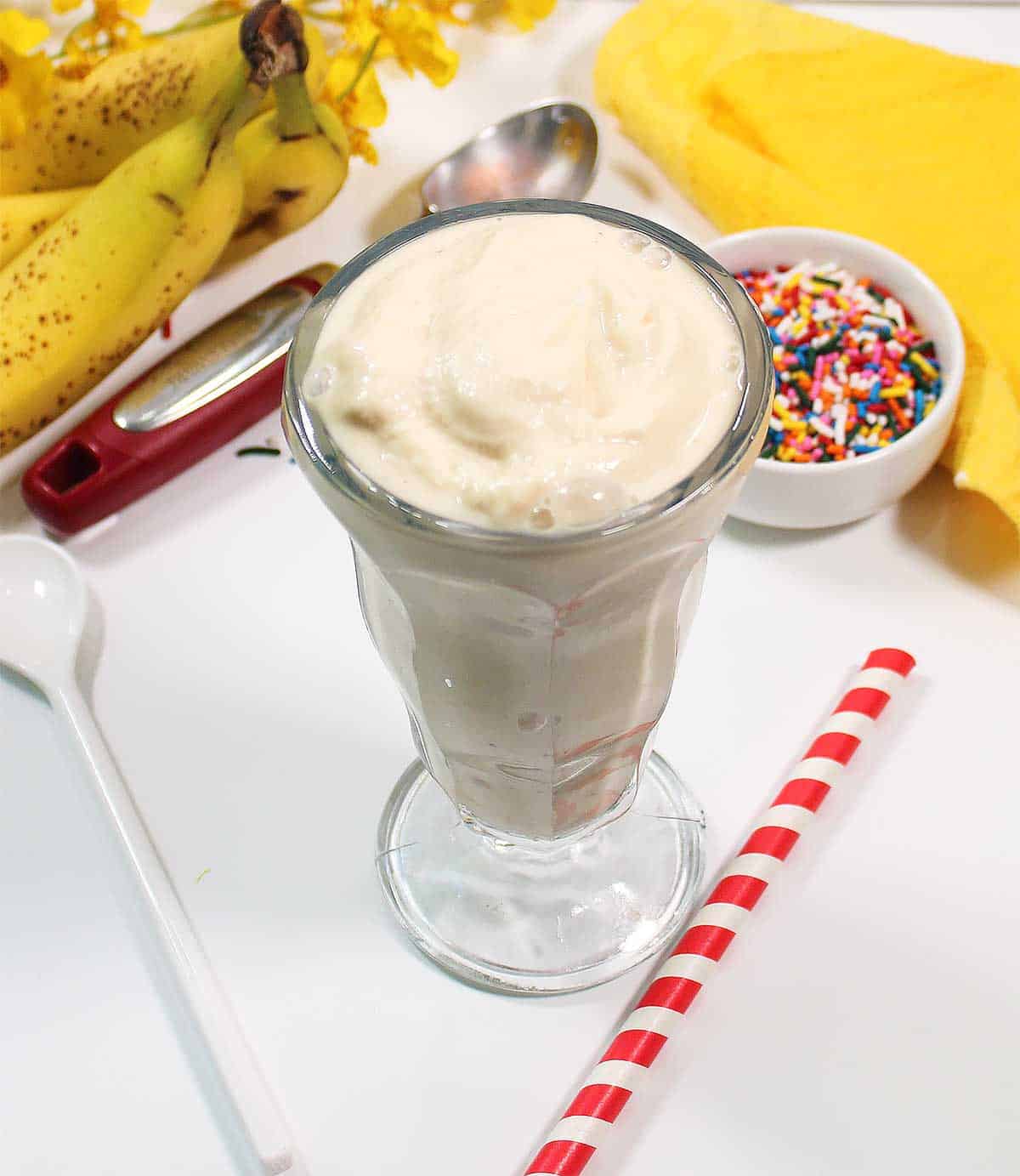 Milkshake in a glass with no toppings.