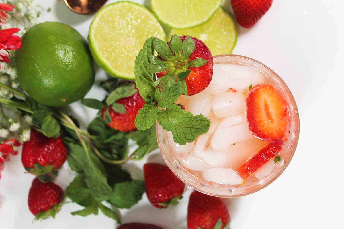 Overhead of garnished strawberry cocktail.