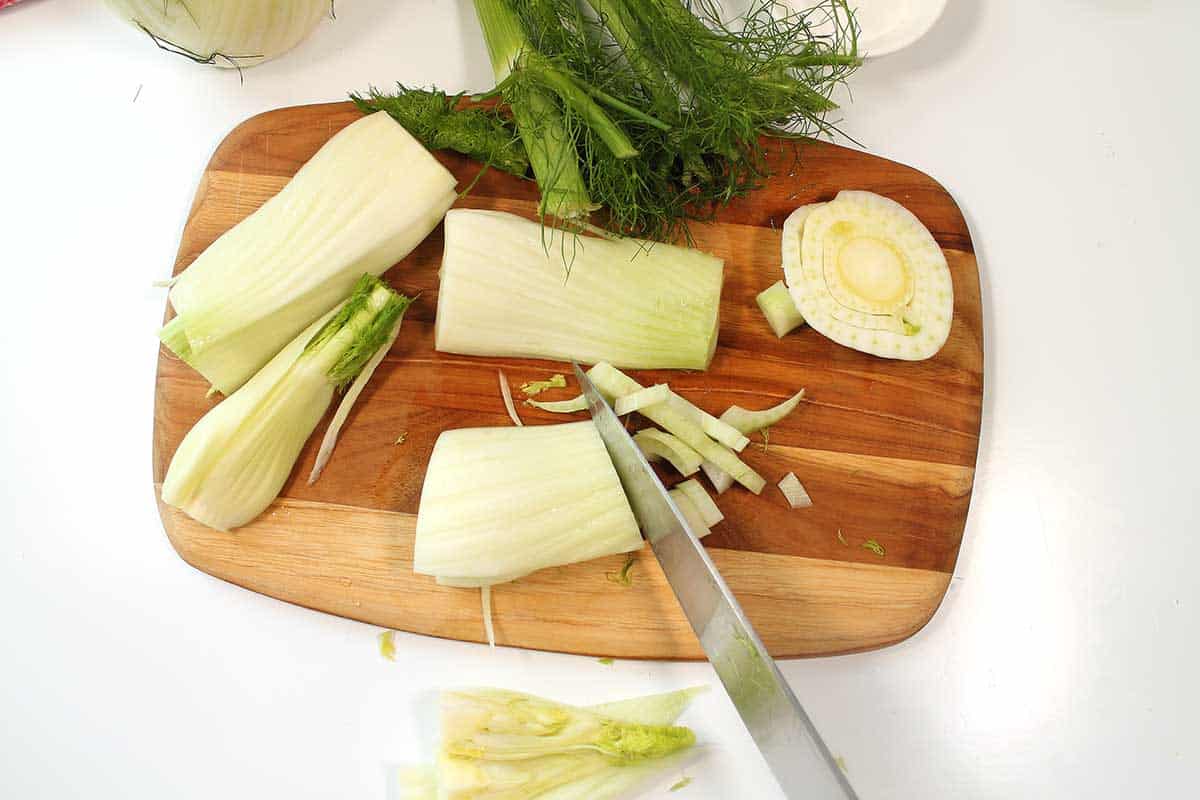 Slicing fennel bulb.