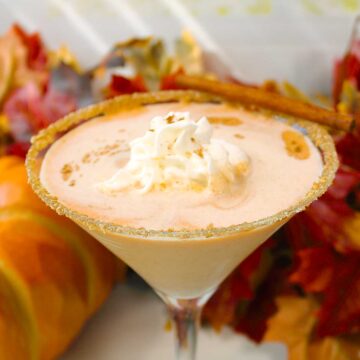 Closeup of garnished pumpkin pie martini with coated rim.