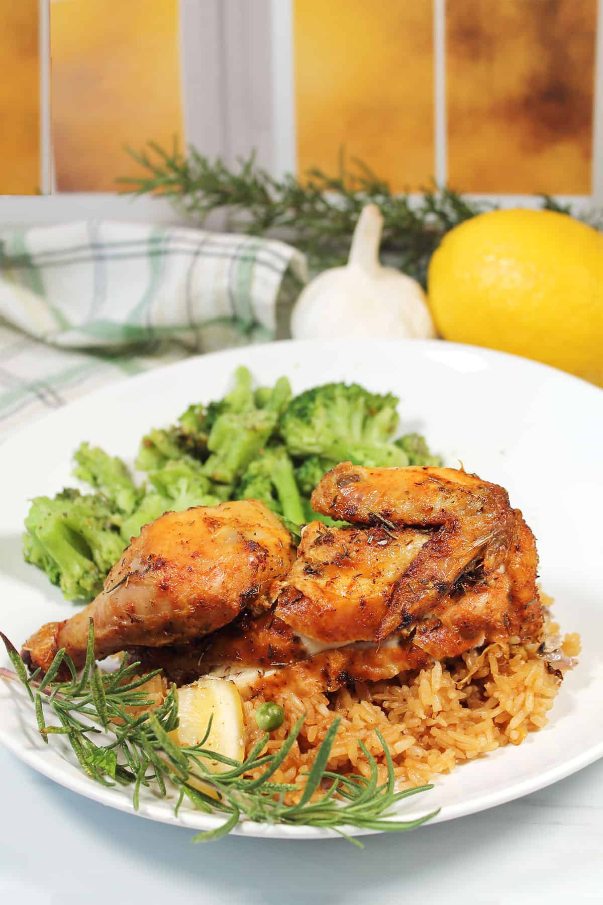 Plated roasted Cornish hens dinner.