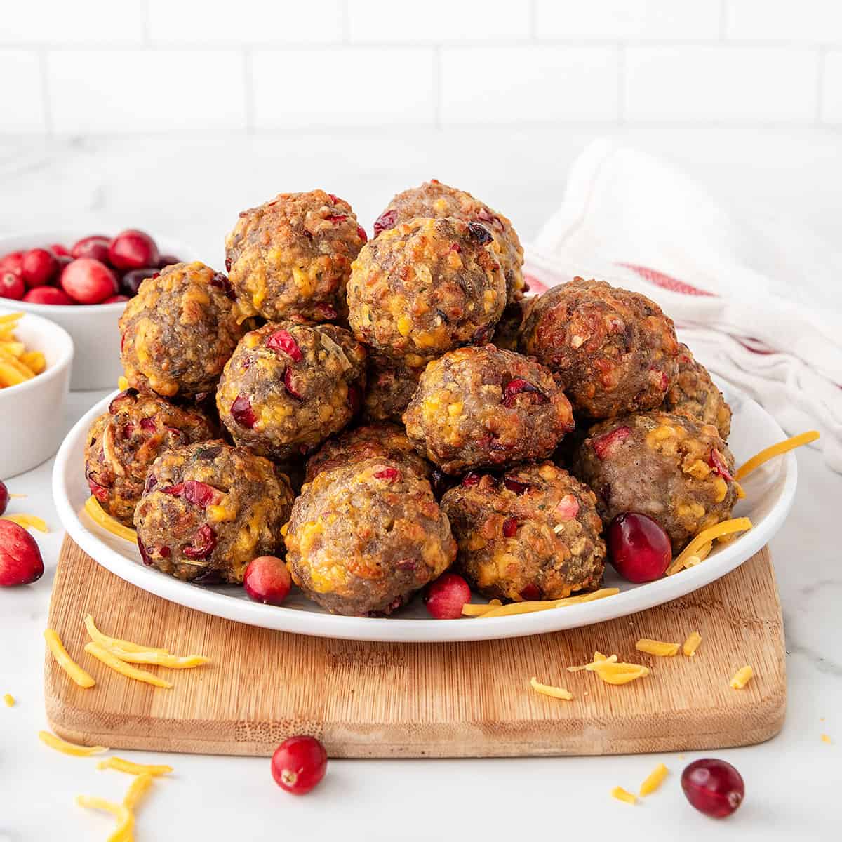 Sausage stuffing balls piled on plate.