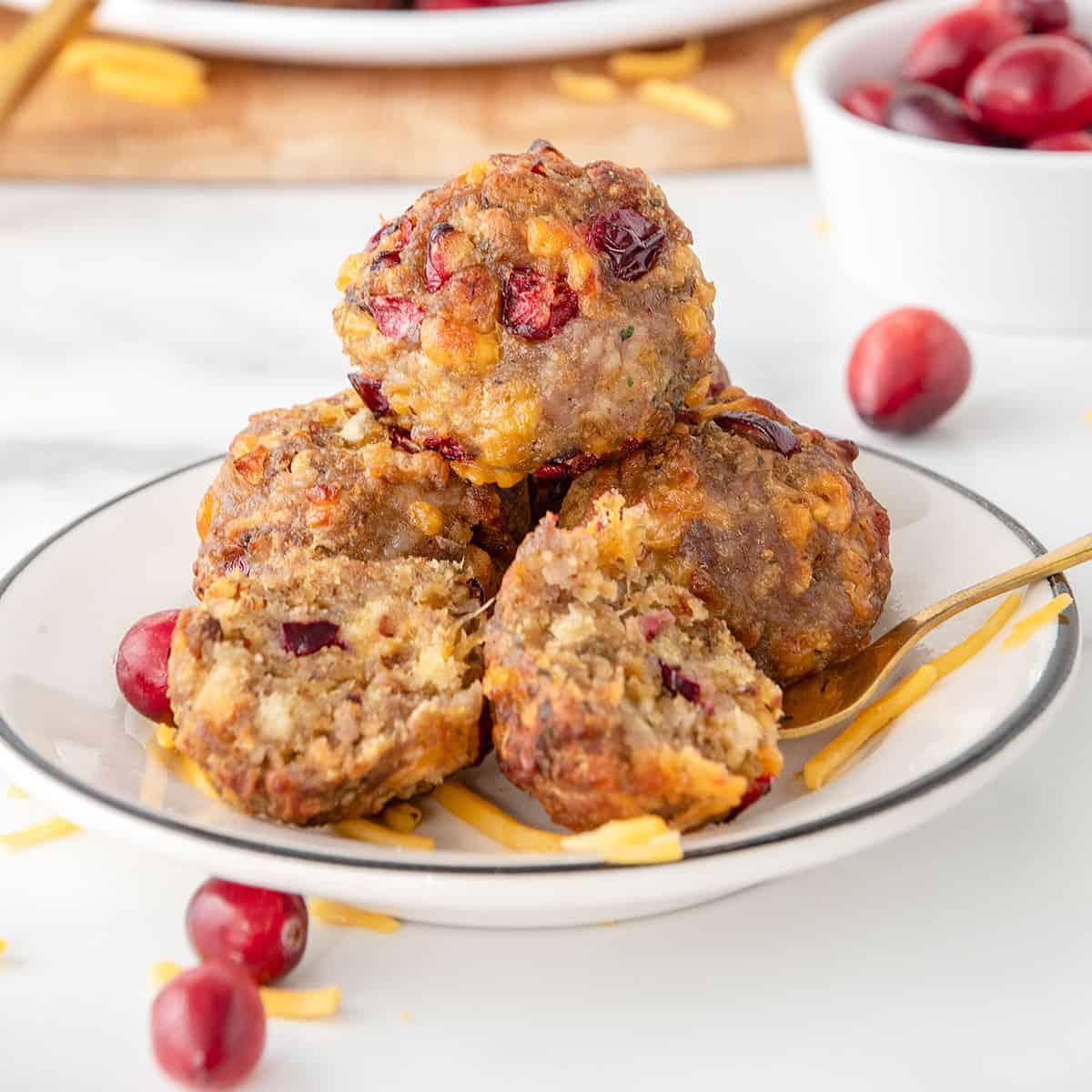 Closeup of halved stuffing balls with gold fork.