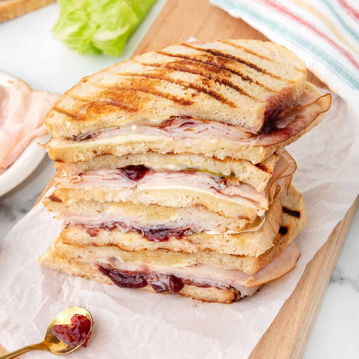 Stacked turkey cranberry brie panini.