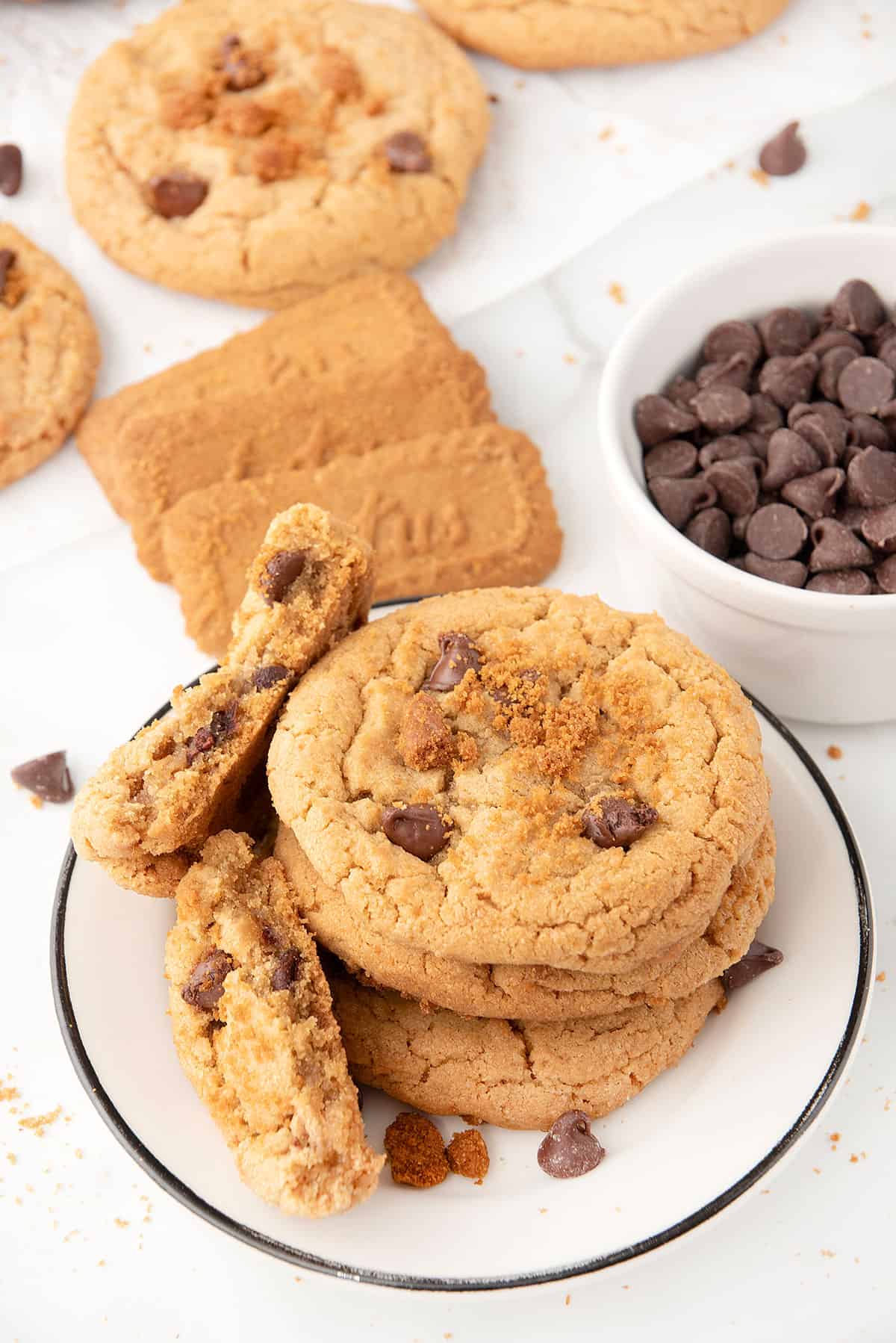 Cookies on plate with biscoff and chocolate chips.