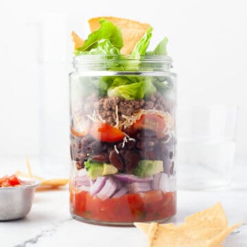 Taco Salad in a Jar with tortilla chips.